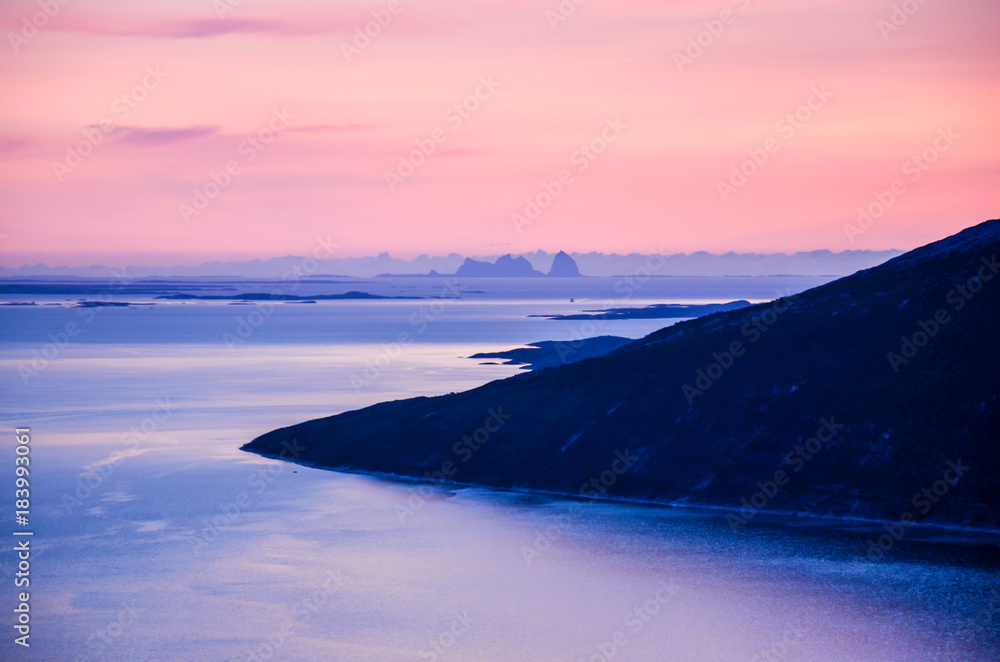 Beautiful scenery at the dusk, view on the sea and small islands in Northern Norway, Scandinavia, Europe
