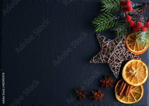 Christmas decorations on a gray background. Abstract Christmas background and place for text.
