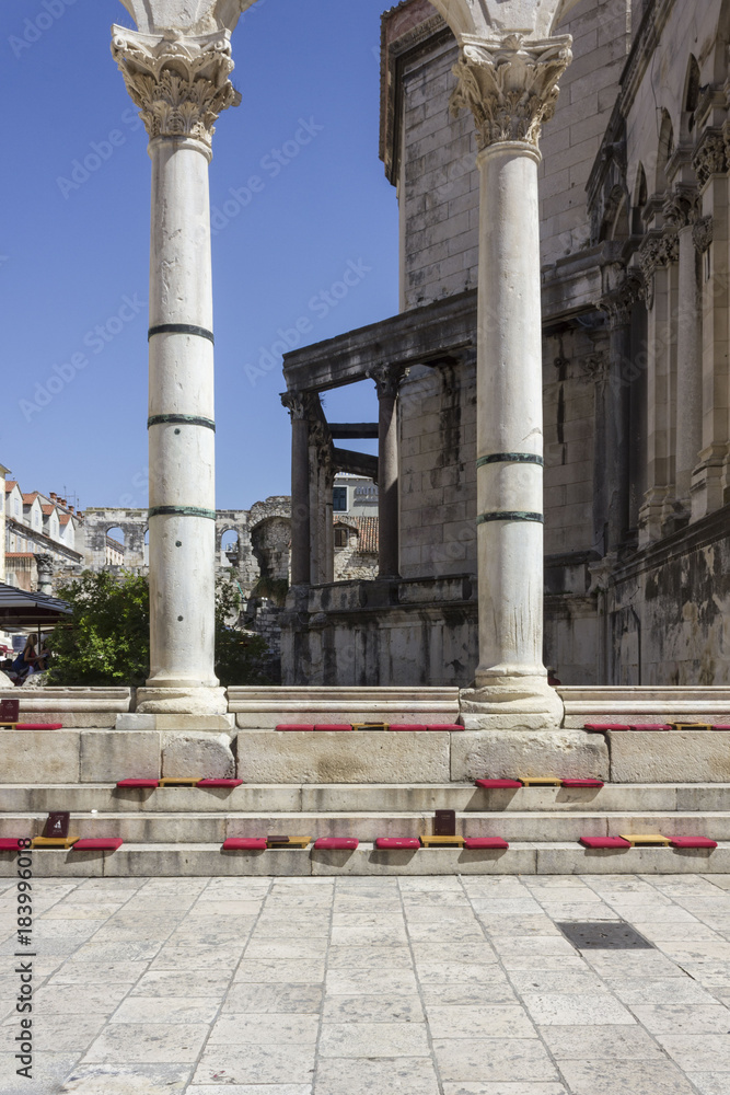 colonnade of Diocletian Palace in the mail square of Split
