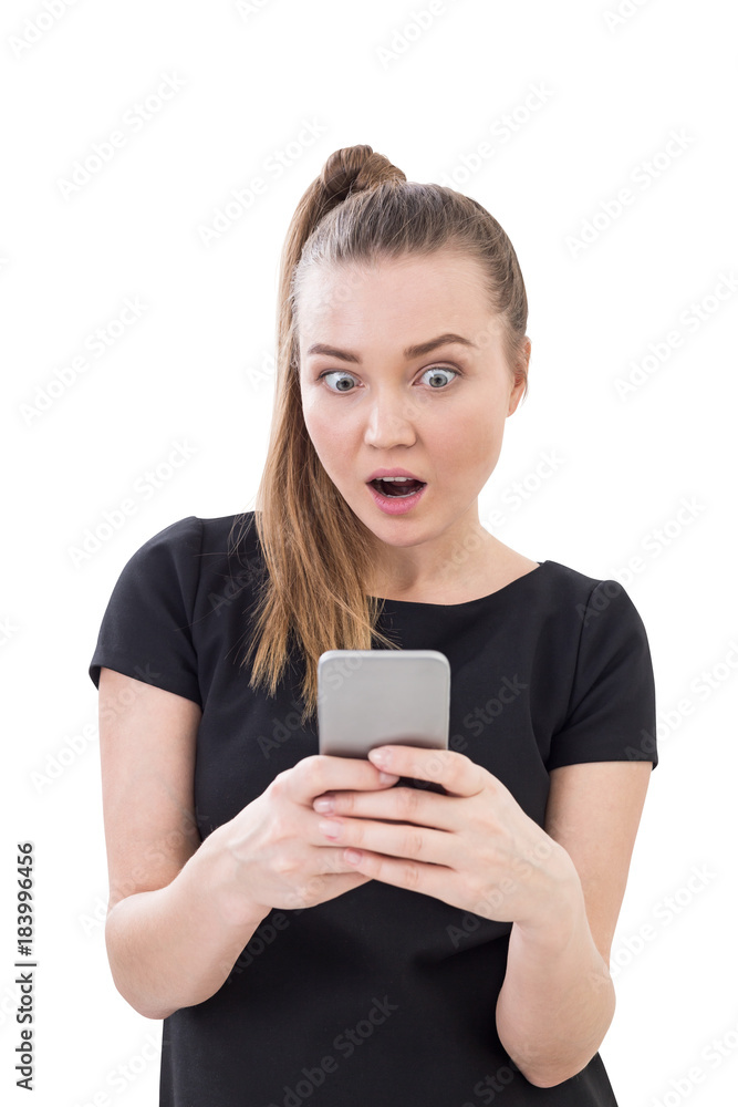 Young astonished woman, smartphone, isolated Young astonished woman, smartphone, isolated