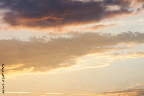 Sky background or texture at the sunset time with clouds. Copy space