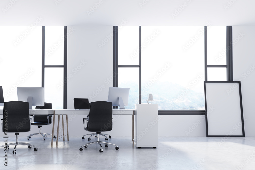 White office with a framed poster