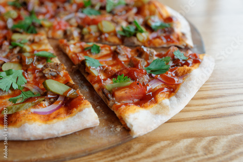 Pizza with meat and barbecue sauce