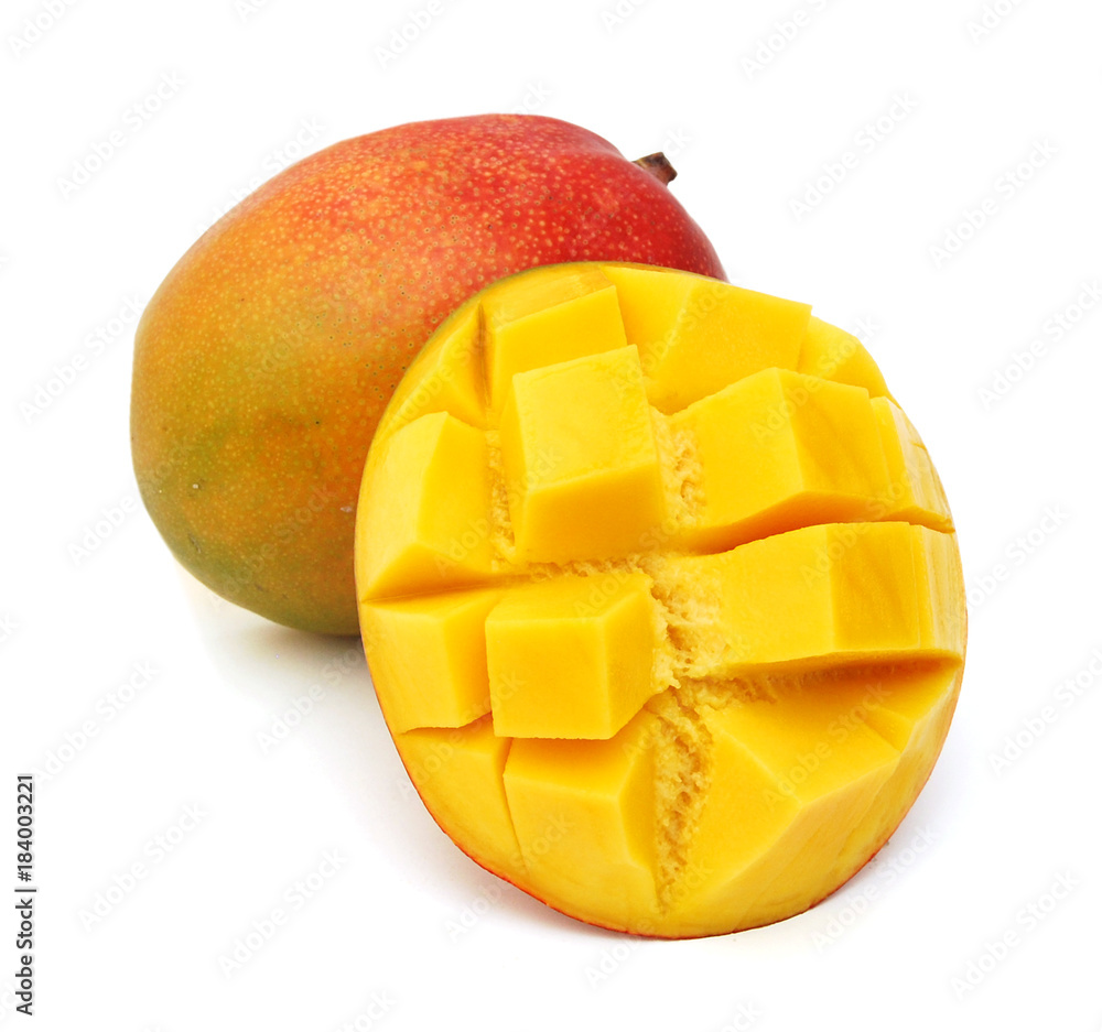 Mango with slices on a white background. Mango with slices on a white background.
