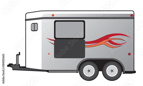 A horse trailer with red and orange graphics is ready to hook up and go