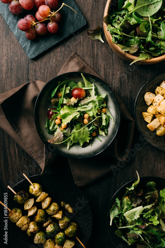 Fresh salad with purple grape and chickpeas