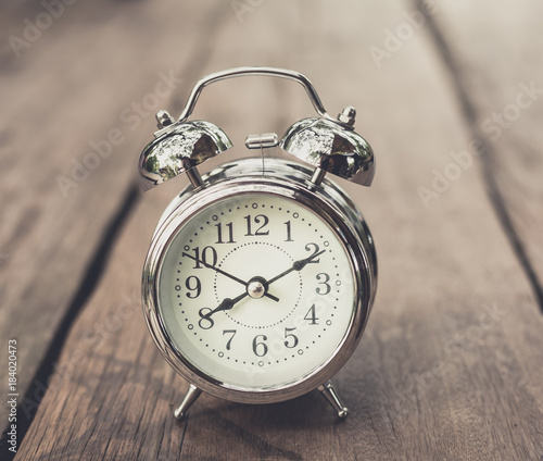 Restro alarm clock on old wood tabel