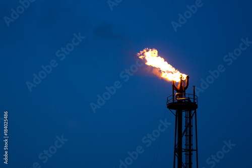 Offshore Oil Rig in The Middle of The Sea and Gas pipelines and fire on oil rig
