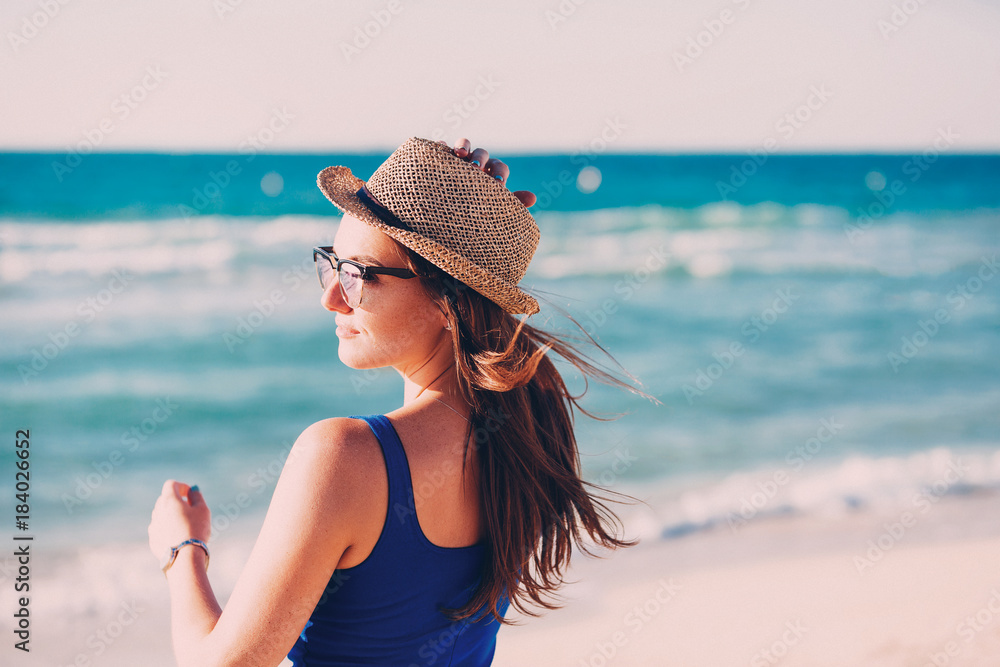 portrait of a beautiful woman on the beach 