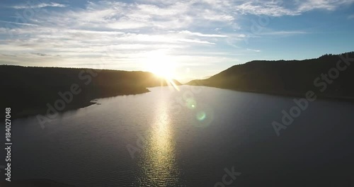 Flying Above a Mountain Lake at Sunset 03