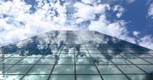 Timelapse of Clouds Reflecting on a Sky Scrapper  