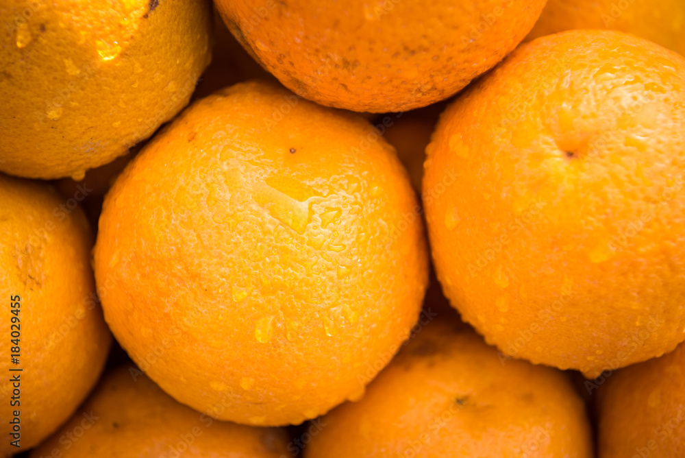 Fresh and wet oranges oranges are for sale. Fresh and wet oranges oranges are for sale.