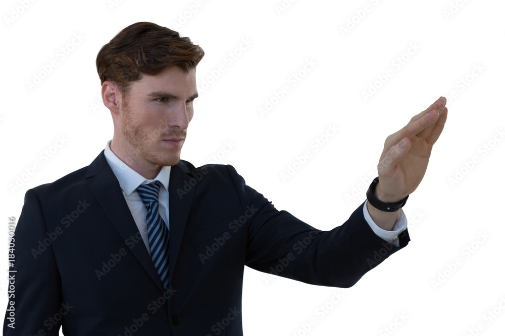 Businessman pretending to use an invisible screen Businessman pretending to use an invisible screen