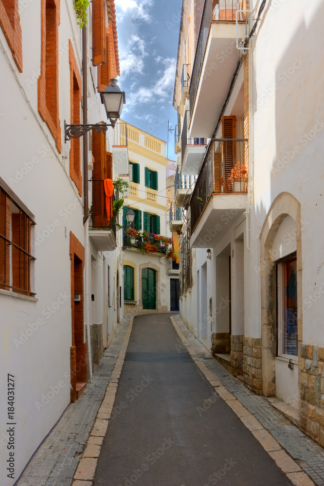 Narrow street in Sitges, Spain