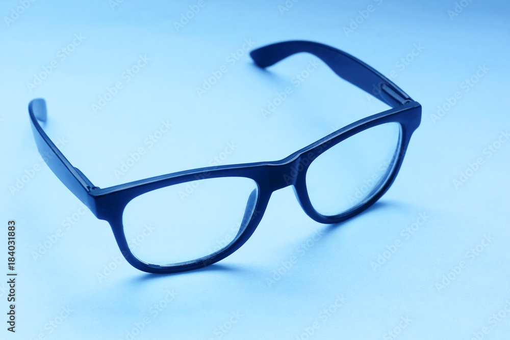 Eyeglasses Over Blue Background Eyeglasses Over Blue Background