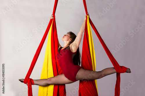 Girl training on aerial silks