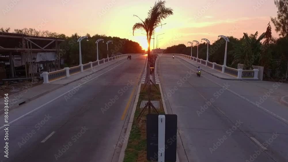 scenery sunrise above Sapanhin sea in Phuket. the new bridge Thepsrisin bridge is comfortable to go to Sapanhin sea.
