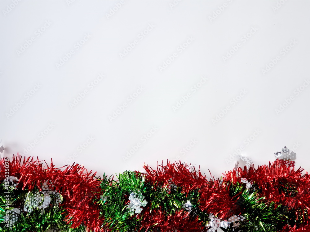 Tinsel of decoration for Christmas, New Year or another holidays on white background Tinsel of decoration for Christmas, New Year or another holidays on white background
