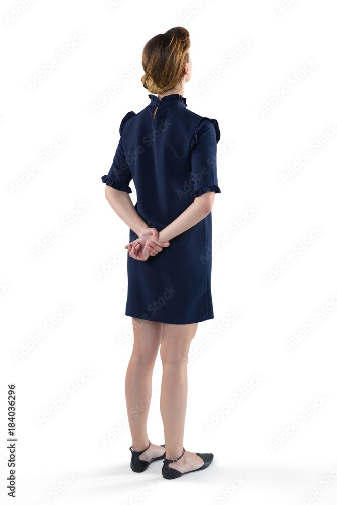 Female executive standing against white background Female executive standing against white background