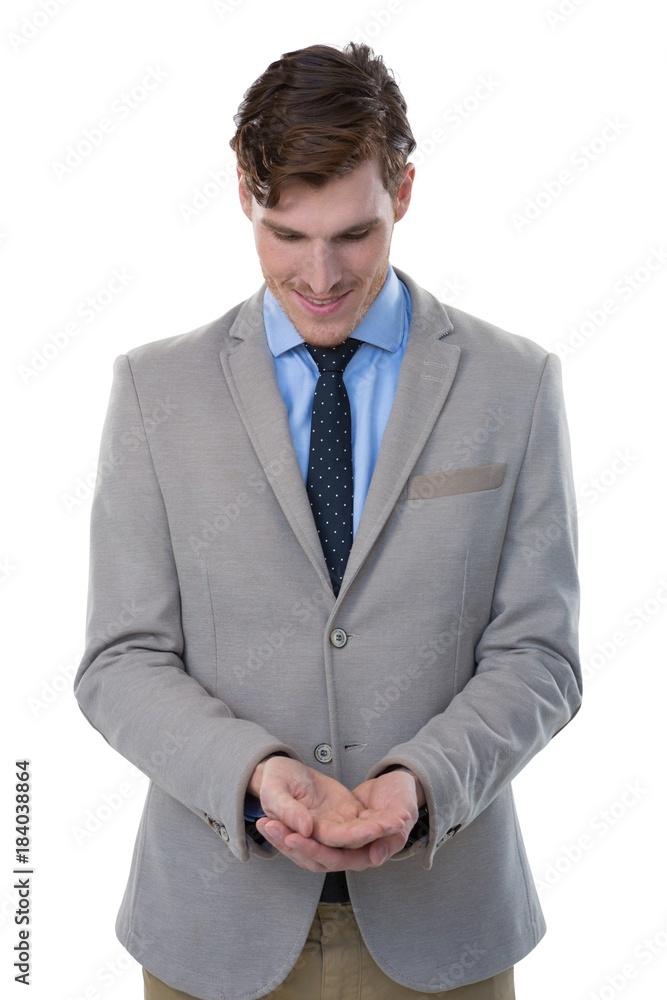 Businessman pretending to hold an invisible object Businessman pretending to hold an invisible object