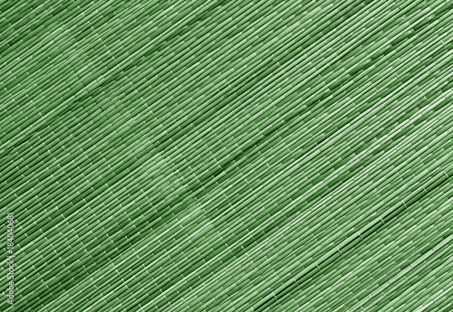 Green tone straw mat surface.