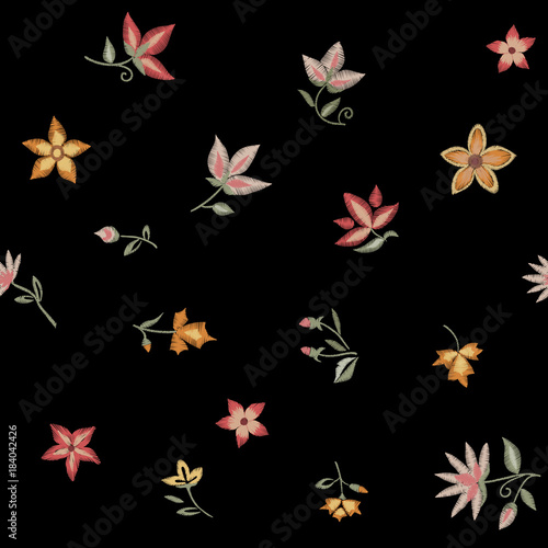 Embroidered flowers. Floral print. Vector seamless pattern.