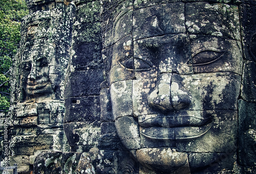 Buddha head in the Bayon temple in Angkor photo