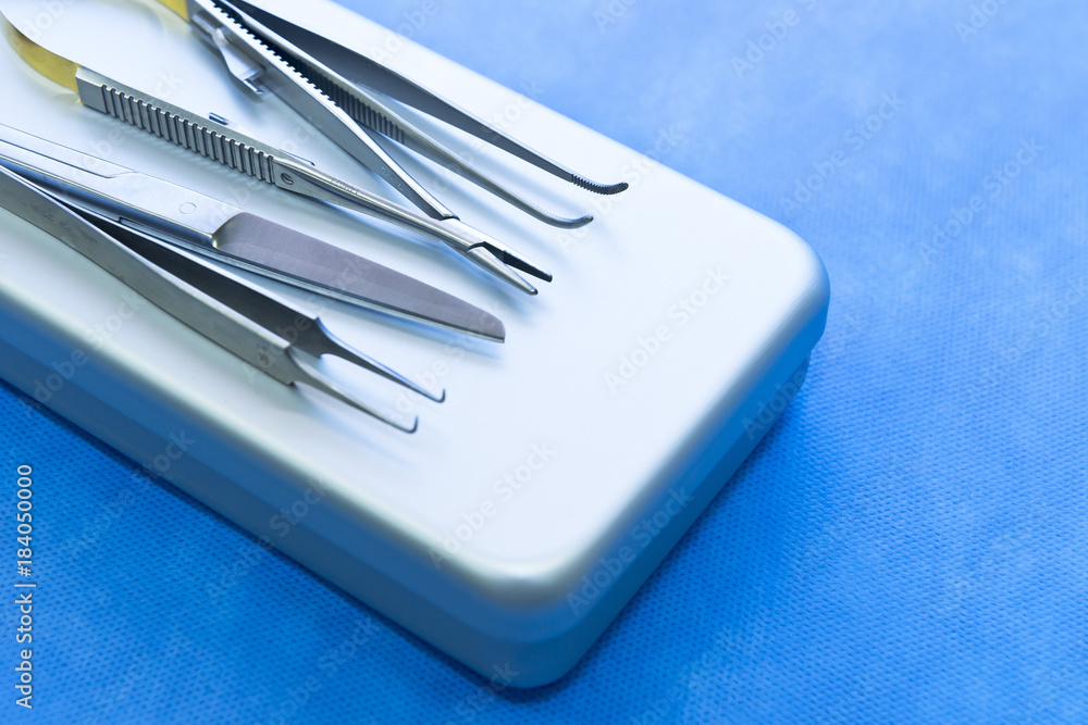 Basic surgical instruments on the sterilized metal tray case Basic surgical instruments on the sterilized metal tray case