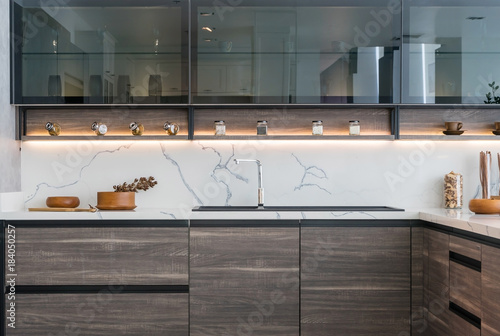 Modern kitchen interior at home with kitchenware