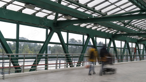 pedestrian motion along transparent bridge