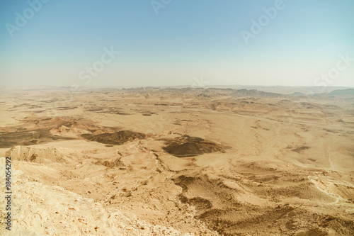 Summer negev desert in Israel. Crater ramon full of sand mountains