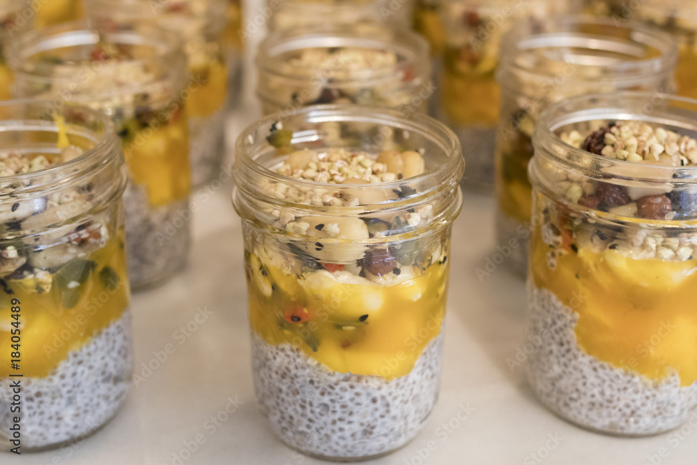 Closeup image of glass vessels with chia seeds, fruits and dry fruits. Closeup image of glass vessels with chia seeds, fruits and dry fruits.