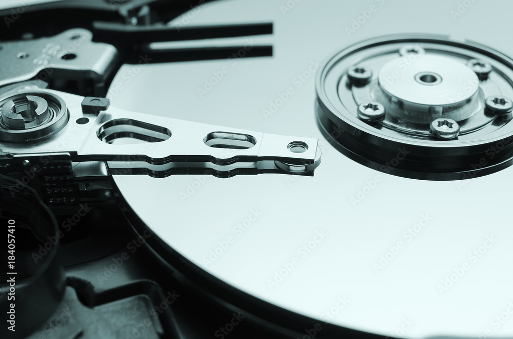 Оpened hard drive close up, contrast light Оpened hard drive close up, contrast light