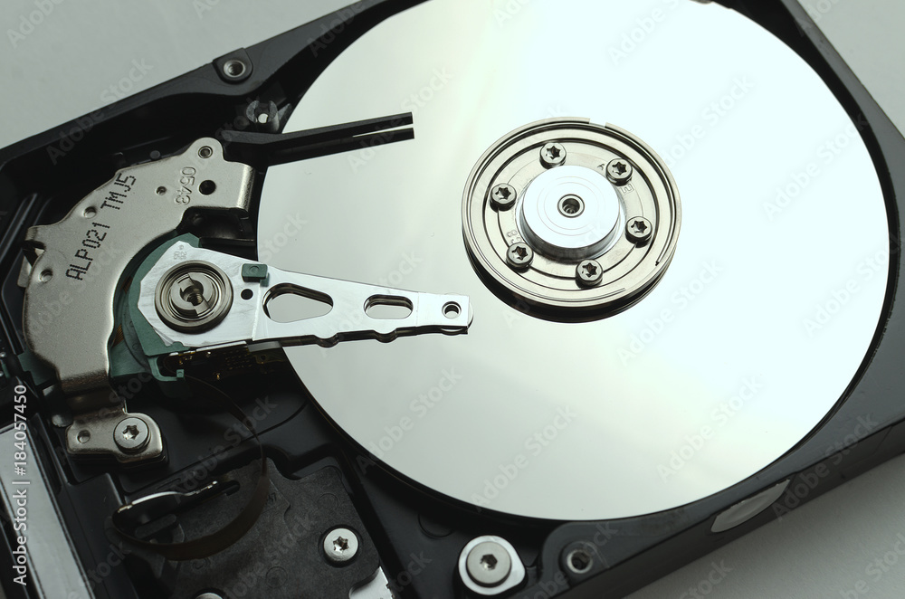 Оpened hard drive close up, contrast light Оpened hard drive close up, contrast light