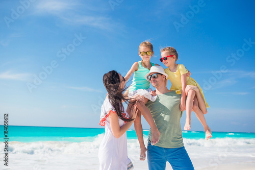 Portrait of family on the beach. Family summer vacation