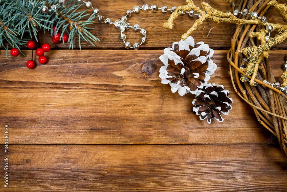 Christmas wooden background with snow branch. Top view with copy space for your text Christmas wooden background with snow branch. Top view with copy space for your text