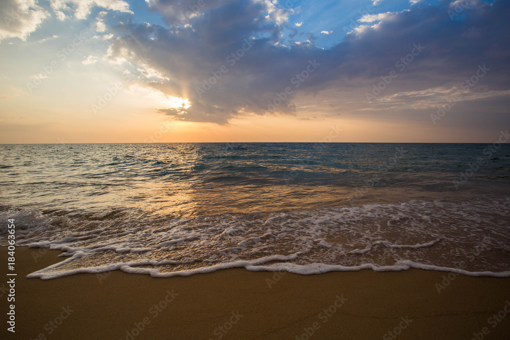 Wave on the beach at sunset. Wave on the beach at sunset.