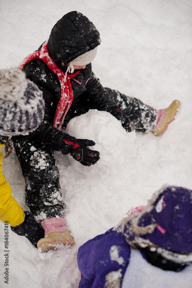 Kids playing in the snow Kids playing in the snow
