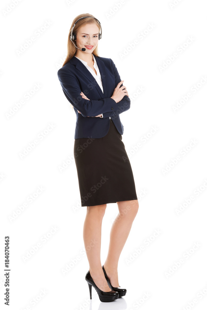 Beautiful caucasian business woman at call center. Beautiful caucasian business woman at call center.