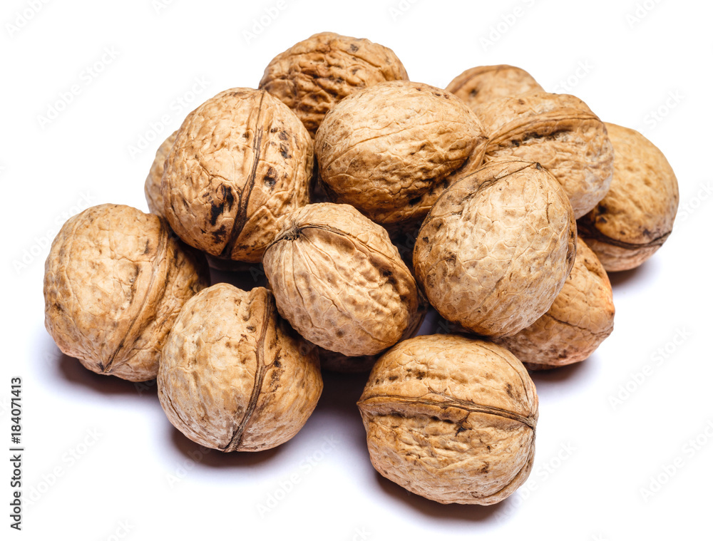 pile of walnuts isolated on white background pile of walnuts isolated on white background