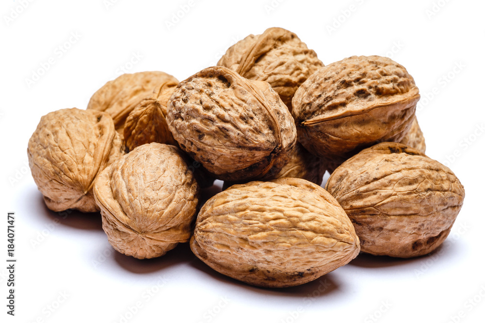pile of walnuts isolated on white background pile of walnuts isolated on white background