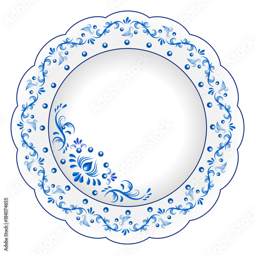 Decorative porcelain plate ornate with blue floral ornament pattern in traditional Russian style Gzhel