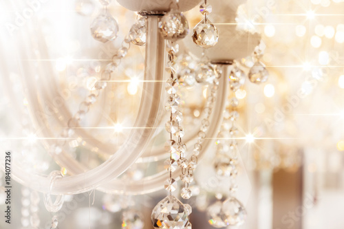 Crystal chandelier close-up. Glamour background with copy space photo