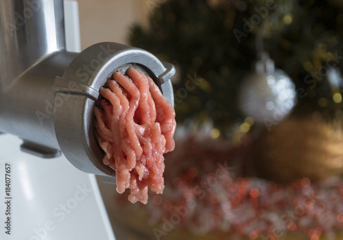 Meat mincer, close-up of fresh minced meat photo