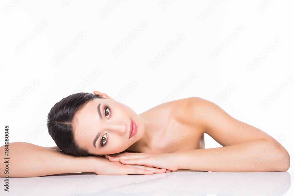 Close up portrait of beautiful young woman face isolated on white background. Portrait of a female model. Close up portrait of beautiful young woman face isolated on white background. Portrait of a female model.