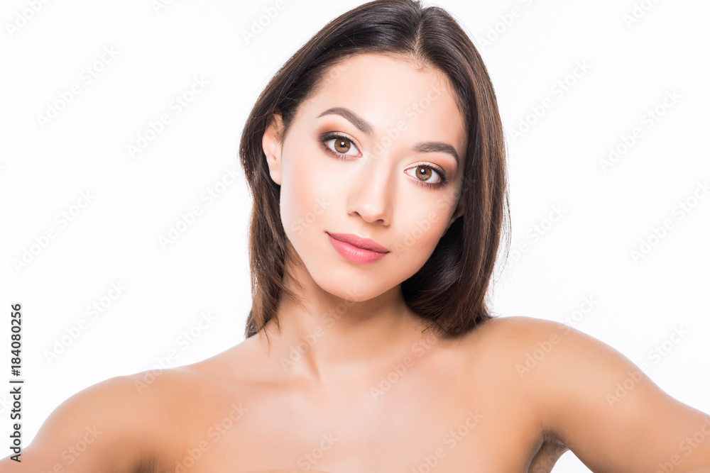 Beautiful elegant young woman with natural nude make up on white background. Professional makeup, perfect skin.