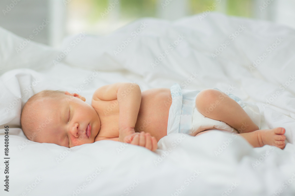 The newborn sleeps. Age 10 days. The newborn sleeps. Age 10 days.