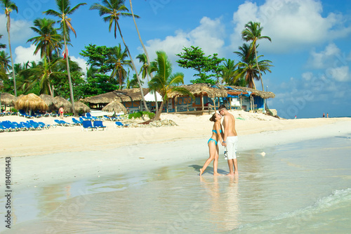 A loving couple on a beach in Punta Cana, Dominican Republic.