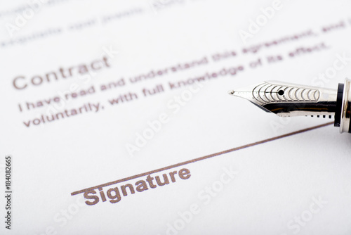 signaure for contract with fountain pen photo