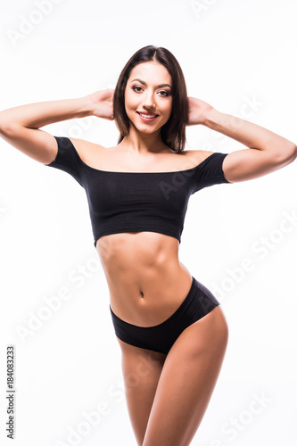 Young woman with beautiful slim perfect body isolated white background